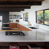  Black + Walnut cabinets with Carrera Marble counters