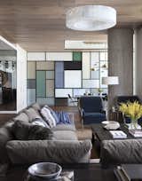 A living space that glows in the day into the evening and perfect for home entertaining. Minotti sectional with McEwen Lighting Studio fixture and Stefan Bishop table