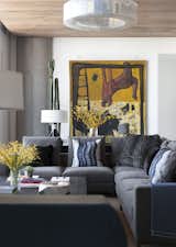 Detail shot of cozy living room with intriguing art piece.