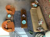 Living Room, Sofa, Ceramic Tile Floor, Table Lighting, Chair, End Tables, and Coffee Tables Authentic mid-century finds, many donated by meat shop customers  Photo 6 of 8 in The Butchers Wife by Windy Tevlin