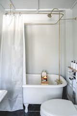 Bath station with salts and candle with cart of toiletries. 