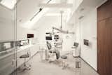 The dental offices are maintained in white tones. The natural light adds an extra level of transparency to the office. 