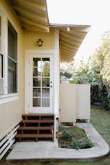 Back entrance with adjacent outdoor shower