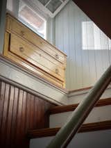 Staircase, Wood Tread, and Wood Railing stairwell  Photo 4 of 11 in living on net zero 50 miles from times square by BETTY