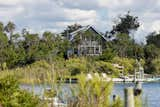 Exterior, Beach House Building Type, Gable RoofLine, Wood Siding Material, and Green Roof Material retreat from afar  Photo 9 of 11 in living on net zero 50 miles from times square by BETTY