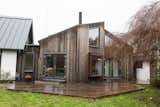 Exterior, Metal Roof Material, Gable RoofLine, Wood Siding Material, and House Building Type The weathered Larch after a year in Dutch weather flown in for the photo session.  Photo 9 of 13 in The house on Dandelion Road by Kenton Knowles