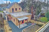 Exterior, Metal Roof Material, Gable RoofLine, House Building Type, and Wood Siding Material Felicity House Exterior Rear  Photo 2 of 13 in Felicity House by Nicole Kimberling