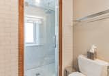Bath Room, Marble Counter, Wall Lighting, Two Piece Toilet, Subway Tile Wall, Ceiling Lighting, Porcelain Tile Floor, Rug Floor, Vessel Sink, and Full Shower 3rd Fl. Shower View   Photo 19 of 29 in Guest House #2 by Monica Gagliardi