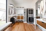 Owners closet with washer dryer