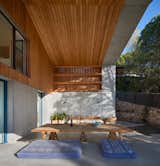 Wood and concrete are the main materials of the project, also used in the porch
