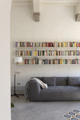 Living room. TMC lamp by Santa & Cole
Tria bookcase by Mobles 114
Vito sofa by Design Republic
