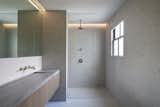 seamless master bathroom with recessed shower pan and trough sink