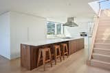 extensive island as the central organization of the kitchen