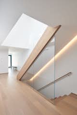 stairway extends to entry doorway and to lower lever