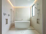 wetroom shower stall with floating tub