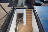 Staircase, Glass Railing, and Wood Tread Retractable Roof Hatch  Photo 9 of 23 in House on Flint by Alan Tse