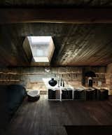 Bedroom, Bed, Wall Lighting, Dark Hardwood Floor, Floor Lighting, and Bookcase  Photos from Sacré coeur, Stone House