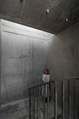 Staircase, Metal Railing, and Stone Tread skylight in stairwell  Photo 3 of 14 in Gable House by UA Lab by UA Lab