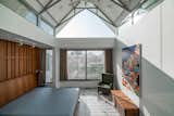 Bedroom, Ceiling Lighting, Bed, Limestone Floor, and Chair bedroom  Photo 4 of 14 in Gable House by UA Lab by UA Lab