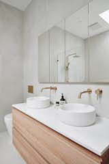 Double basin vanity in the master ensuite for ease of use in a shared bathroom.