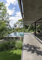 This Concrete-and-Glass House in Paraguay Doesn’t Believe in Walls - Photo 12 of 12 - 