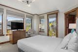Bedroom, Lamps, Storage, Chair, Carpet Floor, Pendant Lighting, and Bed Second Bedroom  Photo 7 of 10 in For $1.95M this Rare Park City Ski-In Ski-Out Condo Can be Yours by Mountain Luxury