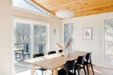 Dining Room, Chair, Pendant Lighting, Table, and Light Hardwood Floor Enjoy memorable group dinners illuminated by the architecturally distinctive Nelson pendant  Photo 6 of 24 in House on Bluebird Lane by Wayward Lane