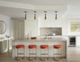 CetraRuddy accessorized the kitchen with brass accents and a geometric console table.