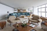 Living Room, Lamps, Pendant Lighting, Coffee Tables, Chair, Sofa, Table Lighting, and Ceiling Lighting CCM Apartment by Bernardes Arquitetura  Bernardes Arquitetura’s Saves from CCM Apartment
