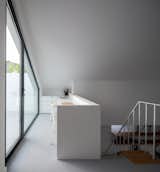 An 18th-Century Sawmill in Portugal Is Revived as a Striking White Gable Home - Photo 10 of 12 - 