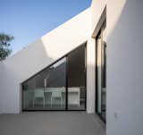 An 18th-Century Sawmill in Portugal Is Revived as a Striking White Gable Home - Photo 5 of 12 - 
