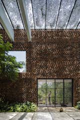 A Biophilic Home in Vietnam Impresses With a Hollow-Brick “Breathing Wall” - Photo 8 of 22 - 
