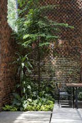 A Biophilic Home in Vietnam Impresses With a Hollow-Brick “Breathing Wall” - Photo 10 of 22 - 