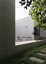 In Spain, a Brick Home Built in Place of an Old Tennis Court Is All Aces - Photo 8 of 14 - 