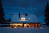 A Hidden Glass Extension With a Reflective Ceiling Cracks Open a Century-Old Cabin - Photo 6 of 21 - 