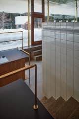 A Hidden Glass Extension With a Reflective Ceiling Cracks Open a Century-Old Cabin - Photo 14 of 21 - 