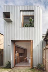 A Terrace Home’s Corrugated Steel Addition Hides Surprisingly Elegant Interiors - Photo 3 of 21 - 