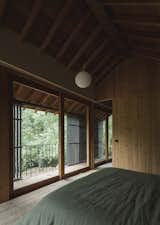 In a Forest in Portugal, a Refined Timber Home Is Hewn From a Traditional Granary - Photo 26 of 33 - 