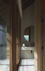 In a Forest in Portugal, a Refined Timber Home Is Hewn From a Traditional Granary - Photo 33 of 33 - 