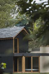 In a Forest in Portugal, a Refined Timber Home Is Hewn From a Traditional Granary - Photo 1 of 33 - 