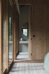 In a Forest in Portugal, a Refined Timber Home Is Hewn From a Traditional Granary - Photo 27 of 33 - 