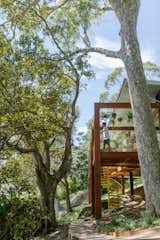 This Home’s Hillside Perch Gives It the Feeling of Floating in the Trees - Photo 4 of 40 - 