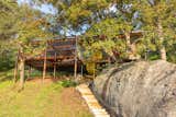This Home’s Hillside Perch Gives It the Feeling of Floating in the Trees - Photo 1 of 40 - 