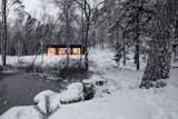 Rhythmic Black Timber Makes This Swedish Cabin Pop Against Its Surroundings - Photo 3 of 32 - 