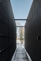 Rhythmic Black Timber Makes This Swedish Cabin Pop Against Its Surroundings - Photo 9 of 32 - 