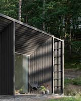 Rhythmic Black Timber Makes This Swedish Cabin Pop Against Its Surroundings - Photo 12 of 32 - 