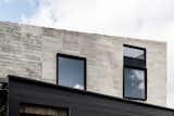 A Black Steel Stair Anchors the Addition of This Raw Concrete Home in Melbourne - Photo 14 of 15 - 