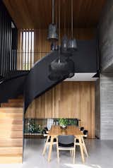 A Black Steel Stair Anchors the Addition of This Raw Concrete Home in Melbourne - Photo 5 of 15 - 