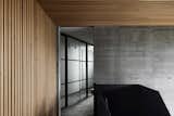 A Black Steel Stair Anchors the Addition of This Raw Concrete Home in Melbourne - Photo 9 of 15 - 