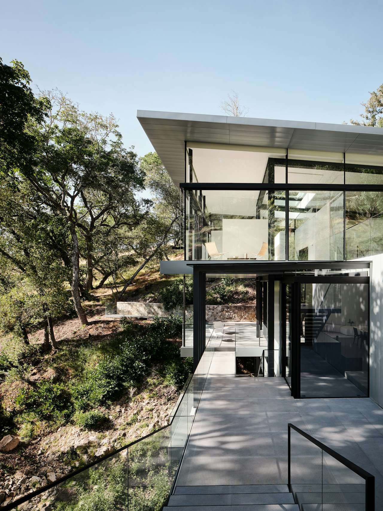 This See-Through California Home Magically Hangs Above a Creek Bed - Dwell